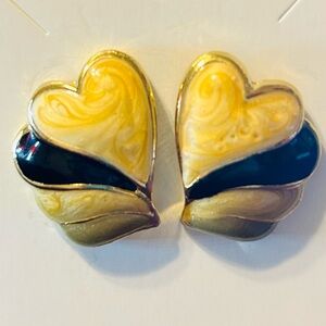 Vintage gold-tone enamel heart-shaped stud earrings, in cream and Black.